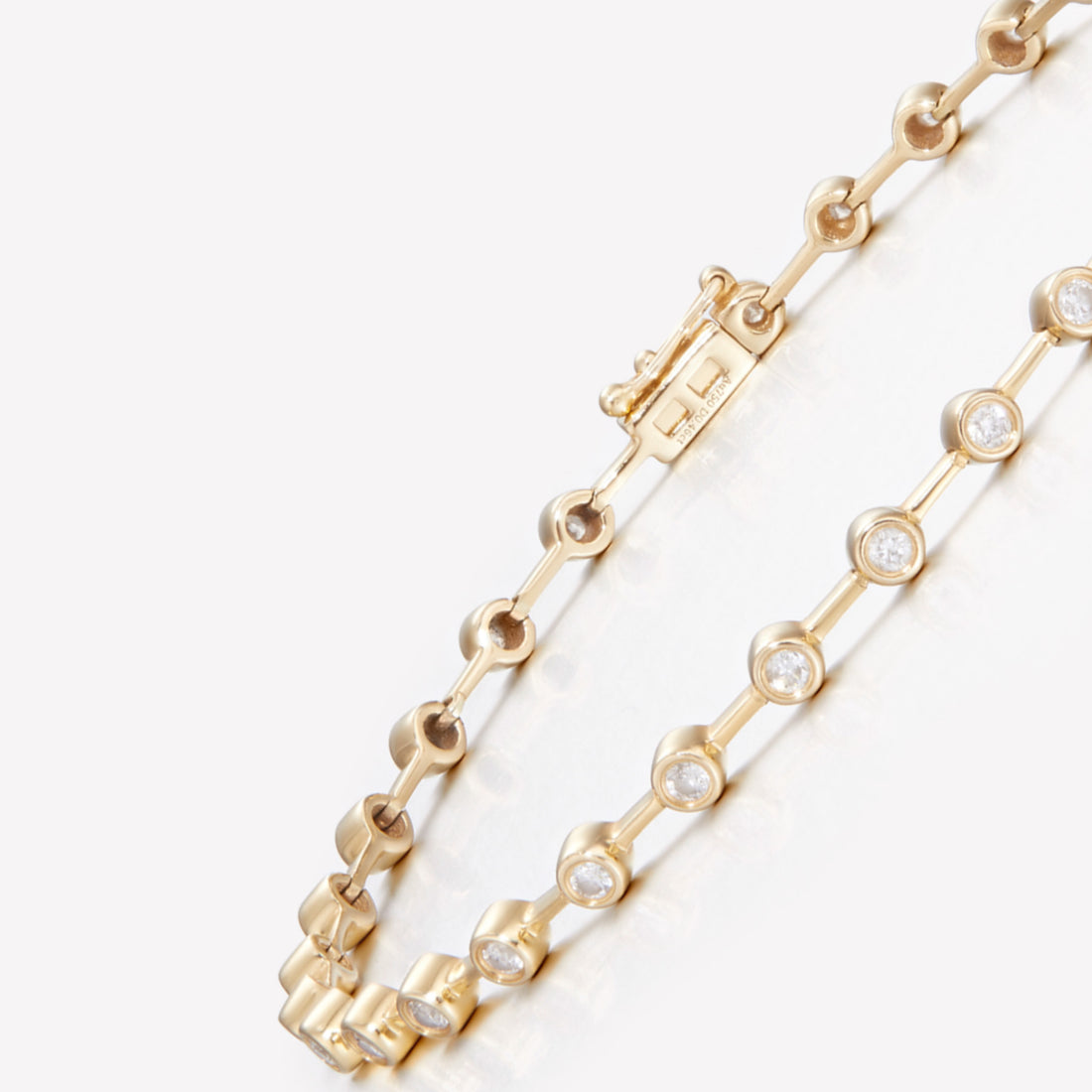 18K Gold Tennis Ball Diamond Bracelet